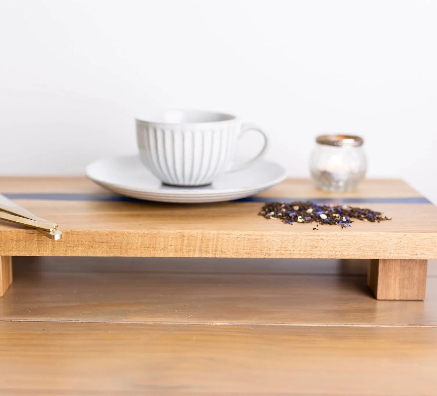 Large rectangle riser pedestal board with resin. Raised acacia board for displaying home decor items or can be used as a faux plants display stand